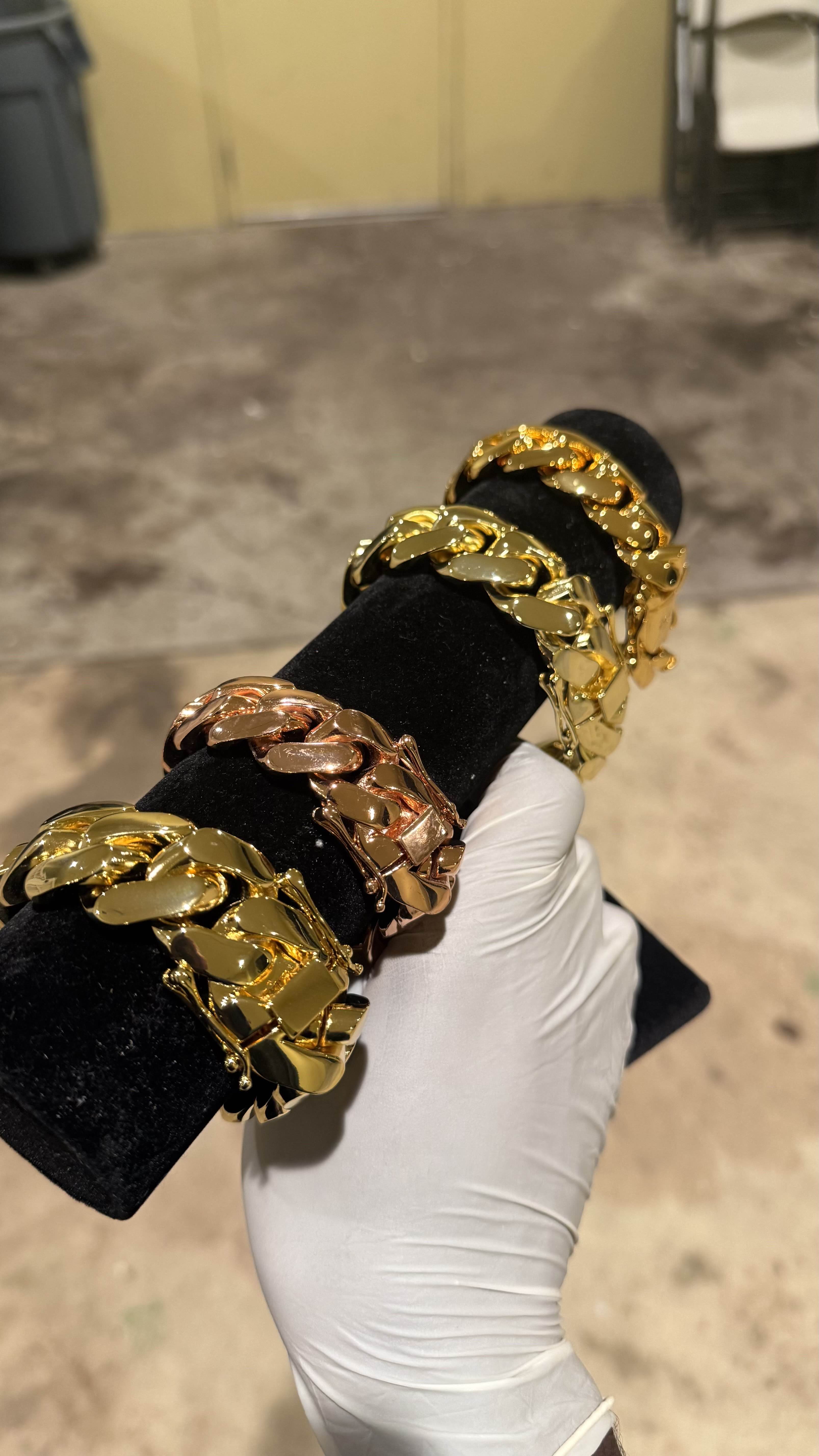 Gold Cuban link bracelet, angled view showing link detail